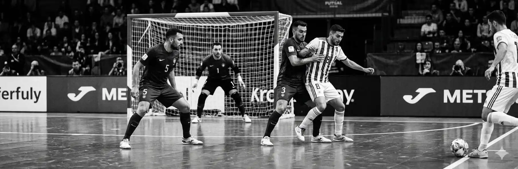Futsal team organised defensively at a set piece