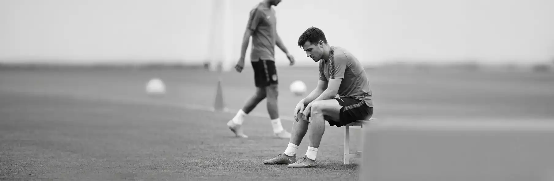 Fitness coach monitoring a football squad's training load in the week after matchday one