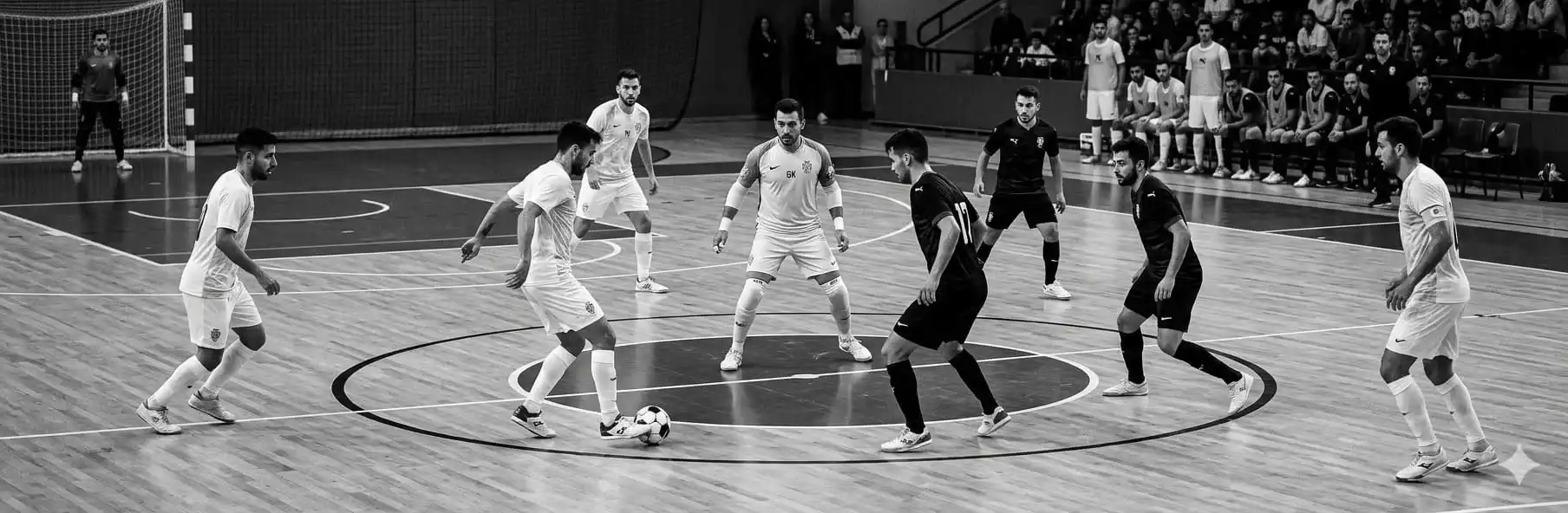 Futsal tactical diagram showing 5v4 positioning with goalkeeper advanced into the field