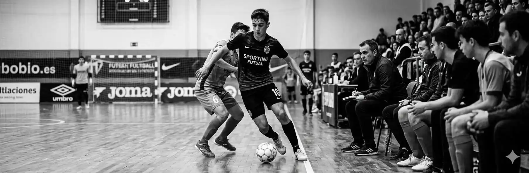 Scout observing young futsal players during a youth match