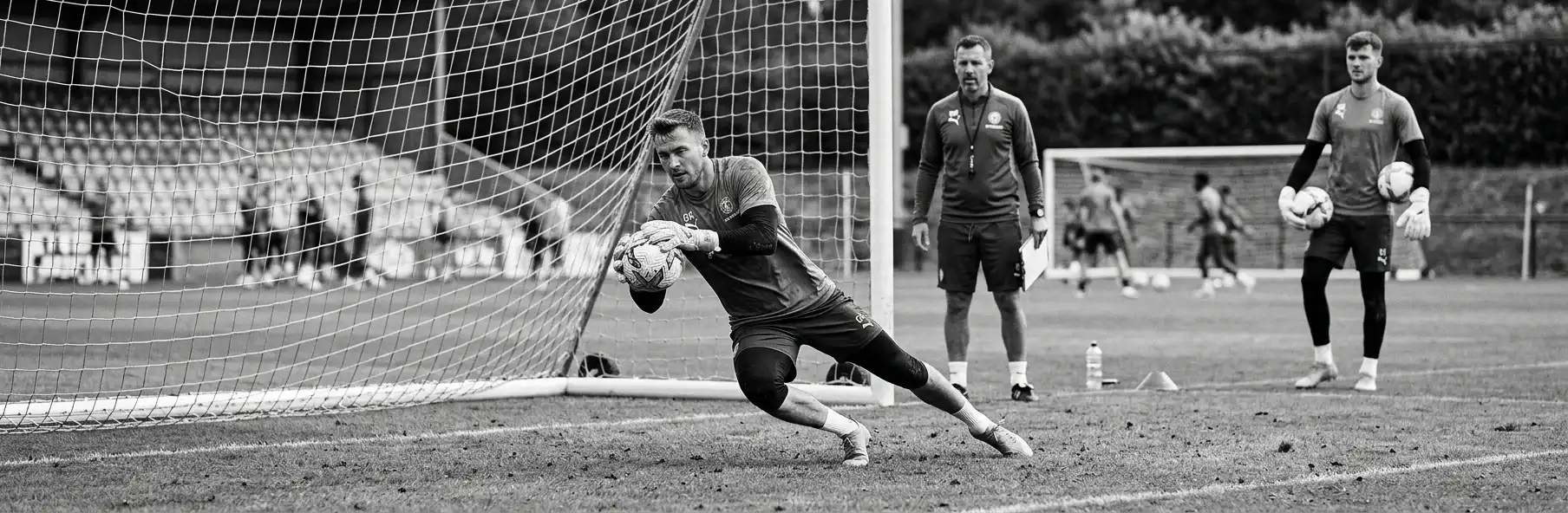 Goalkeeper performing specific training drills in pre-season