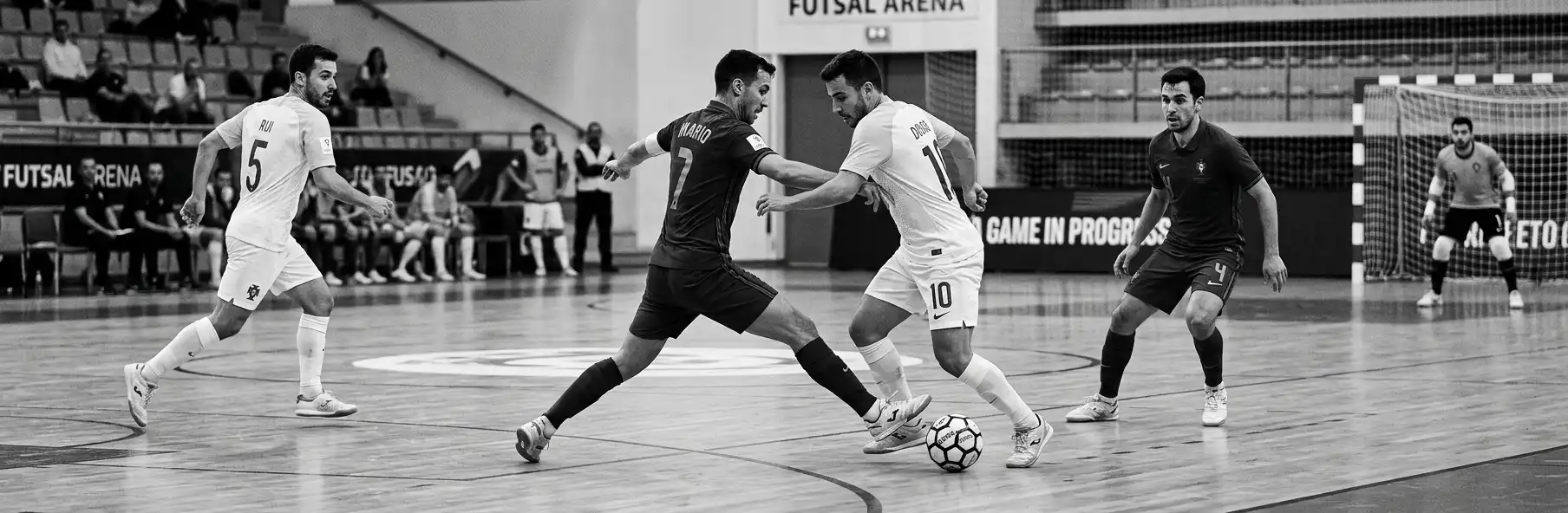 Futsal team pressing high against the opposition on court