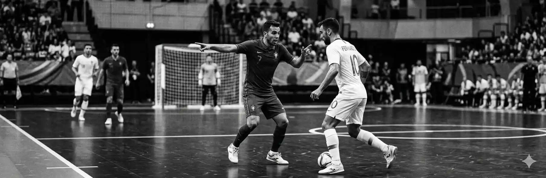 Futsal players communicating on the court during a match