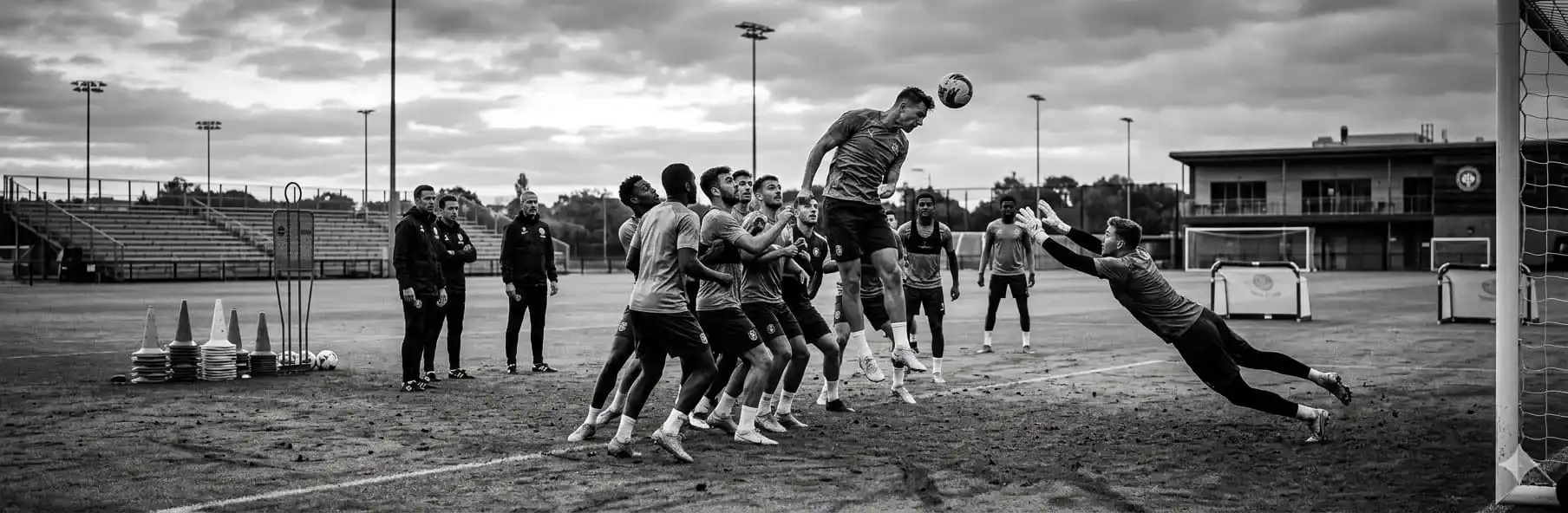 Football players training set pieces during pre-season