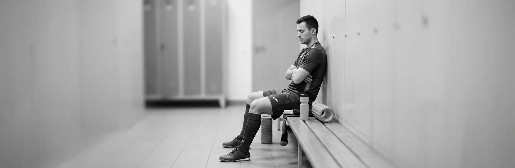 Futsal player resting after training in a double game week