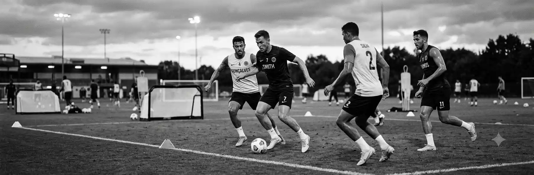 Footballers playing a small-sided game in a coned-off area